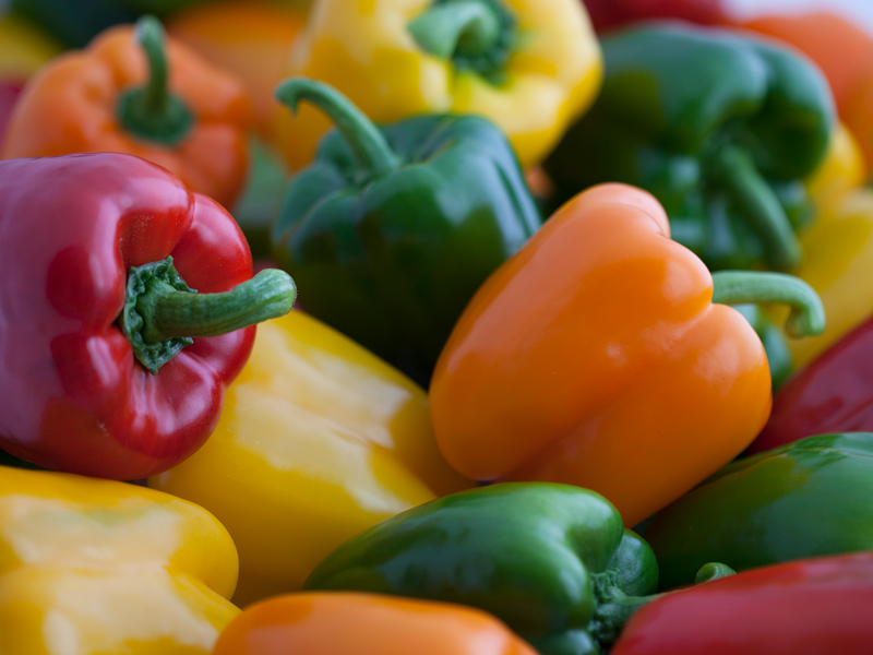 Green, yellow, red and orange sweet bell peppers